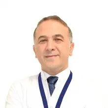 Doç. Dr. Engin Melek — Adana. Portre fotoğrafı.