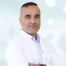 Doç. Dr. Oktay Hasan Öztürk — Antalya. Portre fotoğrafı.