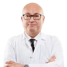 Uzm. Dr. Erdem Tuvay — Radyasyon Onkolojisi, Denizli. Portre fotoğrafı.