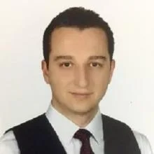 Dt. Baki Eren Çaltıner — Diş Hekimi, Antalya. Portre fotoğrafı.