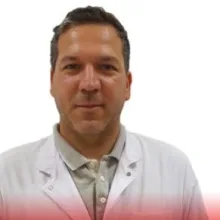 Dr. Öğr. Üyesi Tunis Özdoğanoğlu — Kulak Burun Boğaz. Portre fotoğrafı.