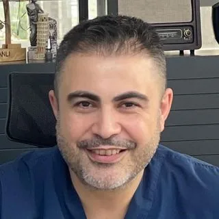 Dr. Dt. Erman Canlı — Samsun. Portre fotoğrafı.