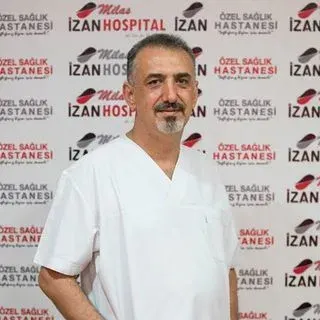 Dt. Ayhan Kurmalı — Diş Hekimi, Milas, Muğla. Portre fotoğrafı.