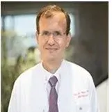 Prof. Dr. Ayhan Olcay — Kardiyoloji, Bahçelievler, İstanbul. Portre fotoğrafı.