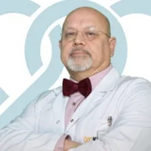 Prof. Dr. Mehmet Ali Özgüven — Nükleer Tıp, Ankara. Portre fotoğrafı.