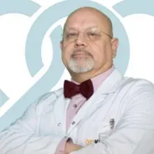 Prof. Dr. Mehmet Ali Özgüven — Nükleer Tıp, Ankara. Portre fotoğrafı.