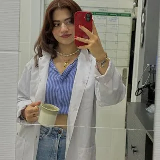 Ody. Ayfer Özgüç — Odyoloji (Dil, Konuşma ve Ses Bozuklukları). Portre fotoğrafı.