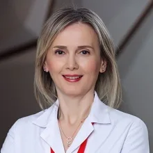 Op. Dr. Emine Barın Ergül — Kadın Hastalıkları Ve Doğum, Bahçelievler, İstanbul. Portre fotoğrafı.