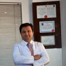 Doç. Dr. Ruşen Atmaca — Kadın Hastalıkları Ve Doğum, Gaziantep. Portre fotoğrafı.