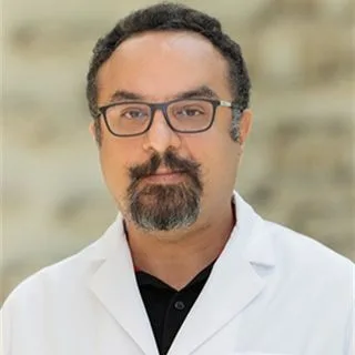 Uzm. Dr. Afşin Dejakam — Çocuk Nörolojisi, Beylikdüzü, İstanbul. Portre fotoğrafı.