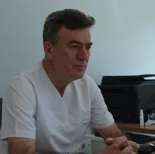 Dt. Recep Ayalp — Diş Hekimi, Bursa. Portre fotoğrafı.