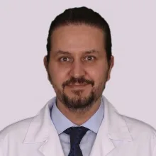 Doç. Dr. Ahmet Altıntaş — Kulak Burun Boğaz, İstanbul. Portre fotoğrafı.