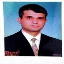 Op. Dr. M. Kürşat Baysal — Kadın Hastalıkları Ve Doğum. Portre fotoğrafı.
