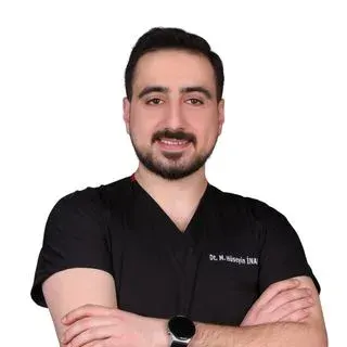 Dt. M. Hüseyin İnanç — Diş Hekimi, Bursa. Portre fotoğrafı.