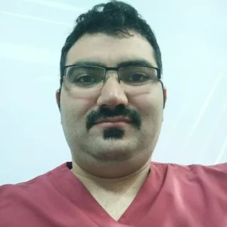 Dt. Ferudun Koşan — Diş Hekimi, Gaziantep. Portre fotoğrafı.