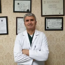 Uzm. Dr. Gürhan Günay — Antalya. Portre fotoğrafı.