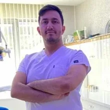 Dt. Hüdai Ali Ertaş — Diş Hekimi, Kayseri. Portre fotoğrafı.