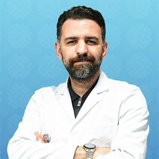 Doç. Dr. Muhammed Asena — Çocuk Sağlığı Ve Hastalıkları, İstanbul. Portre fotoğrafı.