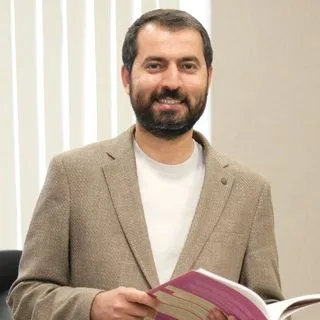 Uzm. Dr. Zafer Güleş — Çocuk ve Ergen Psikiyatrisi, Gaziantep. Portre fotoğrafı.