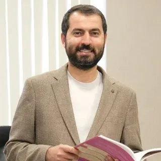 Uzm. Dr. Zafer Güleş — Çocuk ve Ergen Psikiyatrisi, Gaziantep. Portre fotoğrafı.