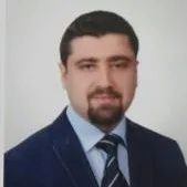 Op. Dr. Burak Açıkgöz — Kalp Ve Damar Cerrahisi. Portre fotoğrafı.
