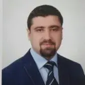 Op. Dr. Burak Açıkgöz — Kalp Ve Damar Cerrahisi. Portre fotoğrafı.