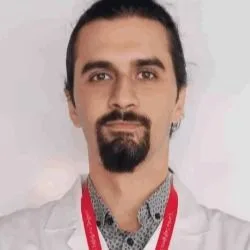 Uzm. Dr. Hüseyin Emre Tosun — Nükleer Tıp, Ankara. Portre fotoğrafı.