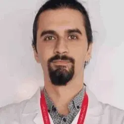 Uzm. Dr. Hüseyin Emre Tosun — Nükleer Tıp, Ankara. Portre fotoğrafı.