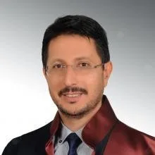 Prof. Dr. Doğan Uncu — Tıbbi Onkoloji, Gaziosmanpaşa, İstanbul. Portre fotoğrafı.