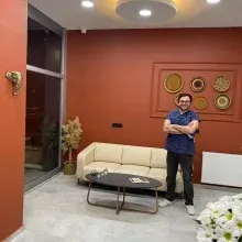 Dt. İlker Fehmi Karagöz — Diş Hekimi, Uşak. Portre fotoğrafı.