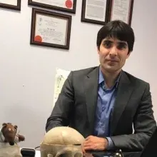 Prof. Dr. Hasan Çağlar Uğur — Beyin Ve Sinir Cerrahisi, Ankara. Portre fotoğrafı.