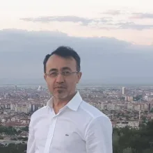 Dr. Öğr. Üyesi Adem Özkan — Plastik Rekonstrüktif Ve Estetik Cerrahi, Konyaaltı, Antalya. Portre fotoğrafı.