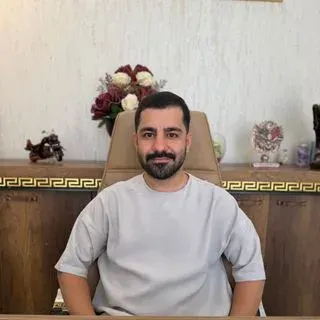Dt. Mehmet Emre Alkanat — Diş Hekimi, Reyhanlı, Hatay. Portre fotoğrafı.