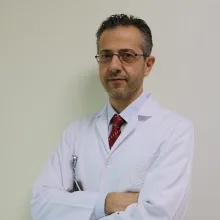 Uzm. Dr. Hamdi Murat Yıldırım — Çocuk Sağlığı Ve Hastalıkları, İstanbul. Portre fotoğrafı.