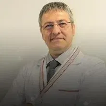 Uzm. Dr. Yaman Sağlam — Tıbbi Genetik, İstanbul. Portre fotoğrafı.