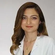 Dt. Emine Karslı — Diş Hekimi, Gaziosmanpaşa, İstanbul. Portre fotoğrafı.