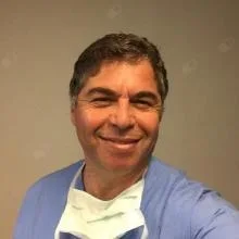 Op. Dr. Özcan Çıklatekerlio — Beyin Ve Sinir Cerrahisi, İstanbul. Portre fotoğrafı.
