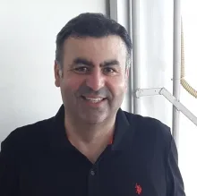 Uzm. Dr. Ali Fuat Baykız — Psikiyatri, Balıkesir. Portre fotoğrafı.