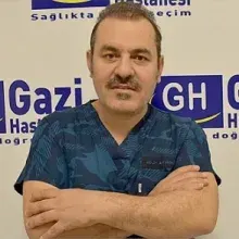 Op. Dr. Nuh Gümüştekin — Kadın Hastalıkları Ve Doğum, İstanbul. Portre fotoğrafı.