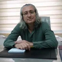 Uzm. Dr. Hasan Kenarlı — Psikiyatri. Portre fotoğrafı.