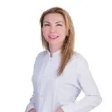 Dt. Reyhan Ölmez — Diş Hekimi, Küçükçekmece, İstanbul. Portre fotoğrafı.