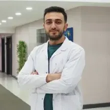 Dt. Özgür Önder — Diş Hekimi, Ankara. Portre fotoğrafı.