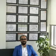 Doç. Dr. Ümit Sertan Çöpoğlu — Psikiyatri, Denizli. Portre fotoğrafı.