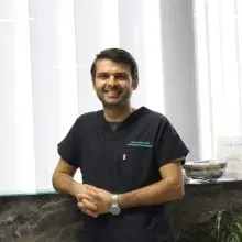 Uzm. Dt. Onur Şahin — Denizli. Portre fotoğrafı.