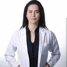 Prof. Dr. Nida (Ergin)Bayık — Kadın Hastalıkları Ve Doğum, İstanbul. Portre fotoğrafı.