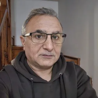 Op. Dr. Bayram Ali Mamik — Kadın Hastalıkları Ve Doğum, Sivas. Portre fotoğrafı.