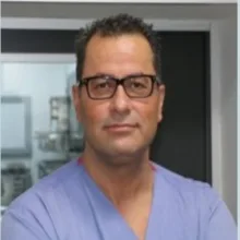 Prof. Dr. Sırrı Sinan Bilgin — El Cerrahisi, Ankara. Portre fotoğrafı.