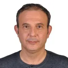 Prof. Dr. İzzet Koçak — Üroloji, Aydın. Portre fotoğrafı.