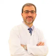 Doç. Dr. Enis Rauf Coşkuner — Üroloji, Bakırköy, İstanbul. Portre fotoğrafı.