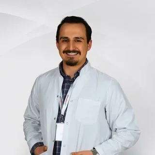 Dt. Hüseyin Muzaç — Diş Hekimi, Selçuklu, Konya. Portre fotoğrafı.